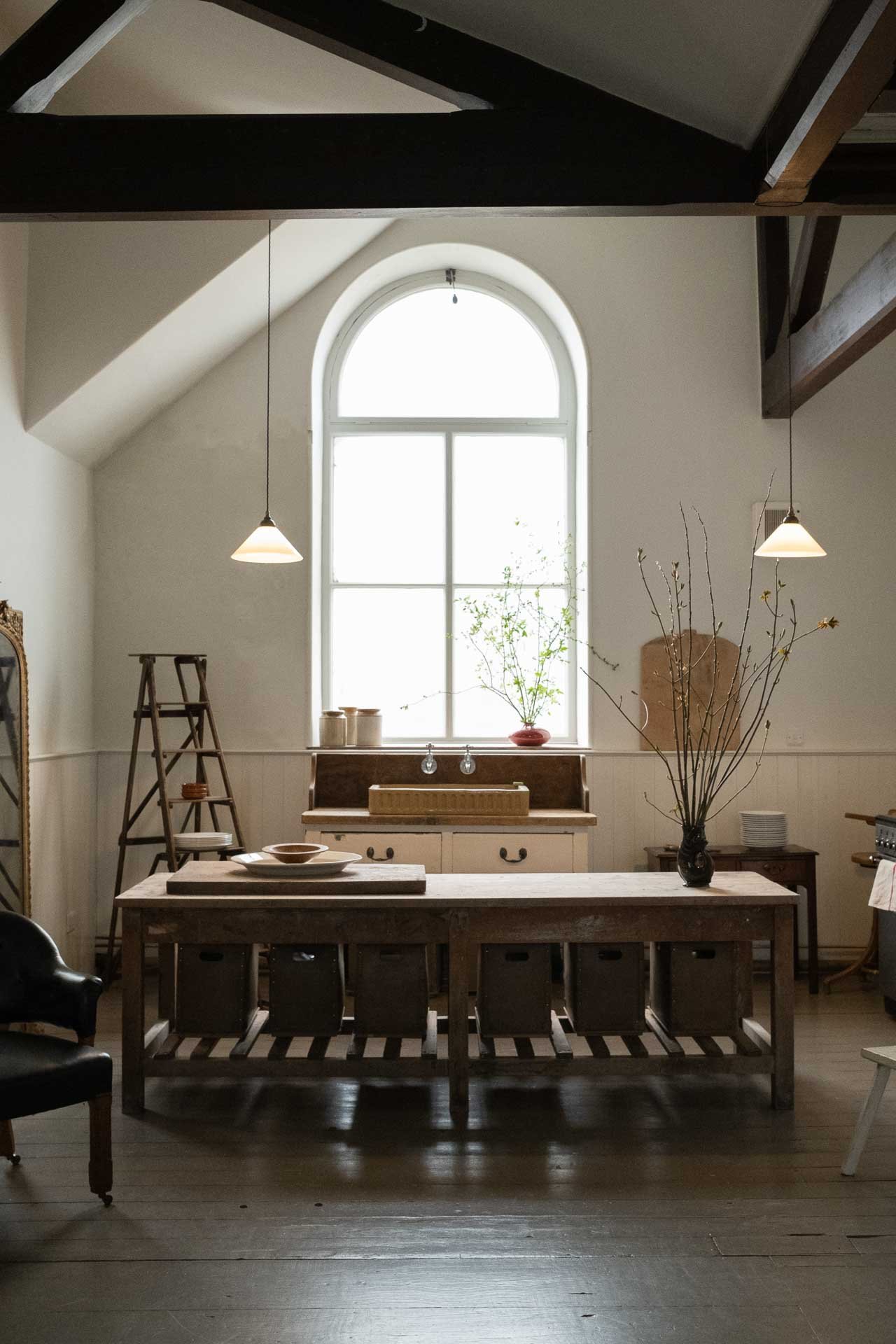 The original large arch window of the kitchen space at Green Street Chapel